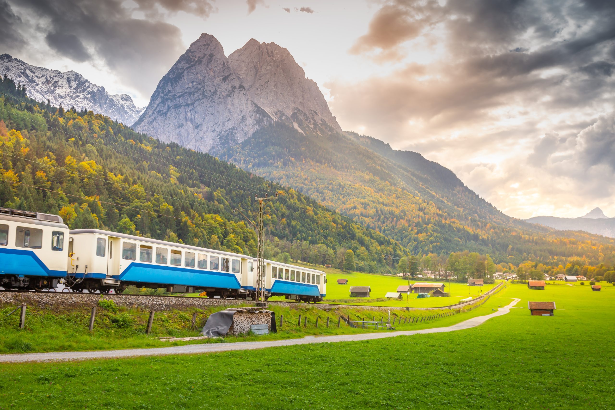 Train,In,Bavarian,Alps,At,Autumn,And,Wooden,Barns,At