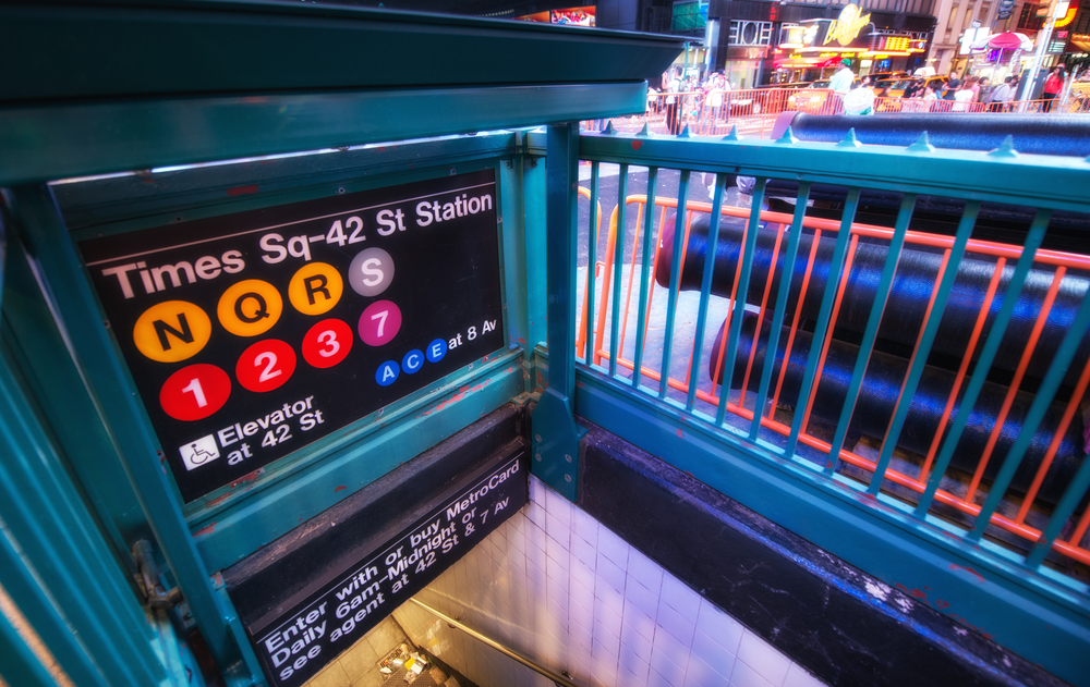 Times Square Entrance subway station at night - New York City.