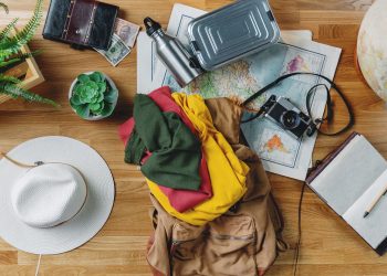 Flat,Lay,Top,View,Desktop,With,Maps,And,Other,Travel