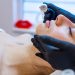 Beautiful,Young,Woman,Getting,A,Face,Treatment,At,Beauty,Salon.