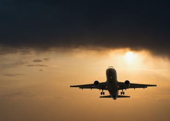 Plane,Goes,On,Takeoff,At,Sunset.,Landing,Plane,At,Sunset.