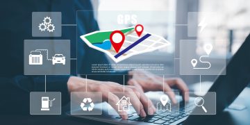 Man,Using,Smartphone,With,Virtual,World,And,Model,Map,With