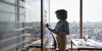 Young,African,American,Executive,Manager,Businesswoman,Writing,Strategy,Ideas,On