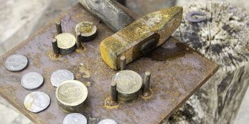 Iron,Coins,With,Mold,In,Hardware,Industry,,Professions,And,Business