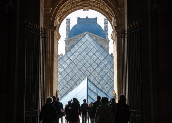 Paris, ,April,7:,Tourists,Walk,Through,The,Passage,To