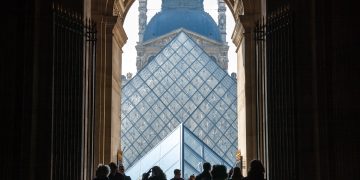 Paris, ,April,7:,Tourists,Walk,Through,The,Passage,To