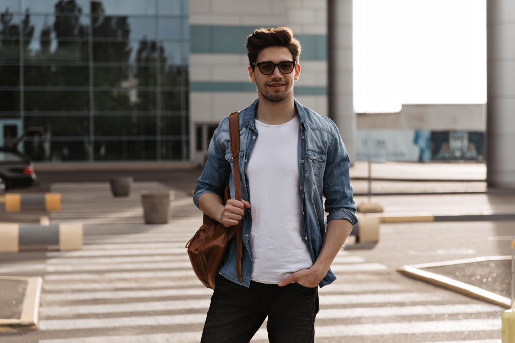 Brunette,Man,In,Denim,Jacket,,Black,Pants,And,White,T shirt