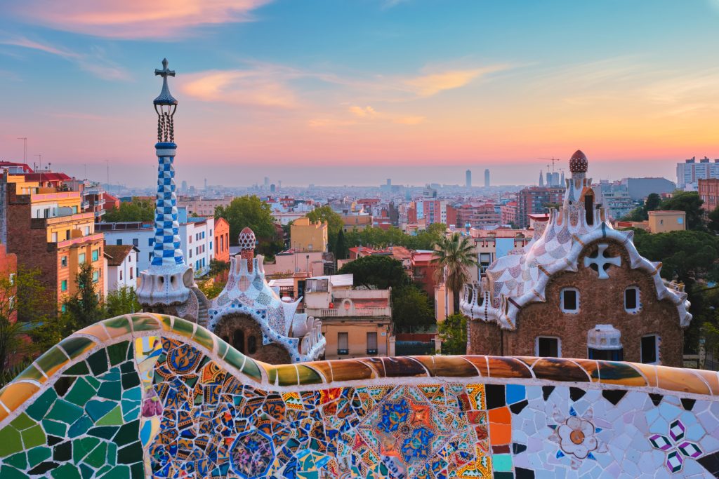 Barcelona,City,View,From,Guell,Park,With,Colorful,Mosaic,Buildings