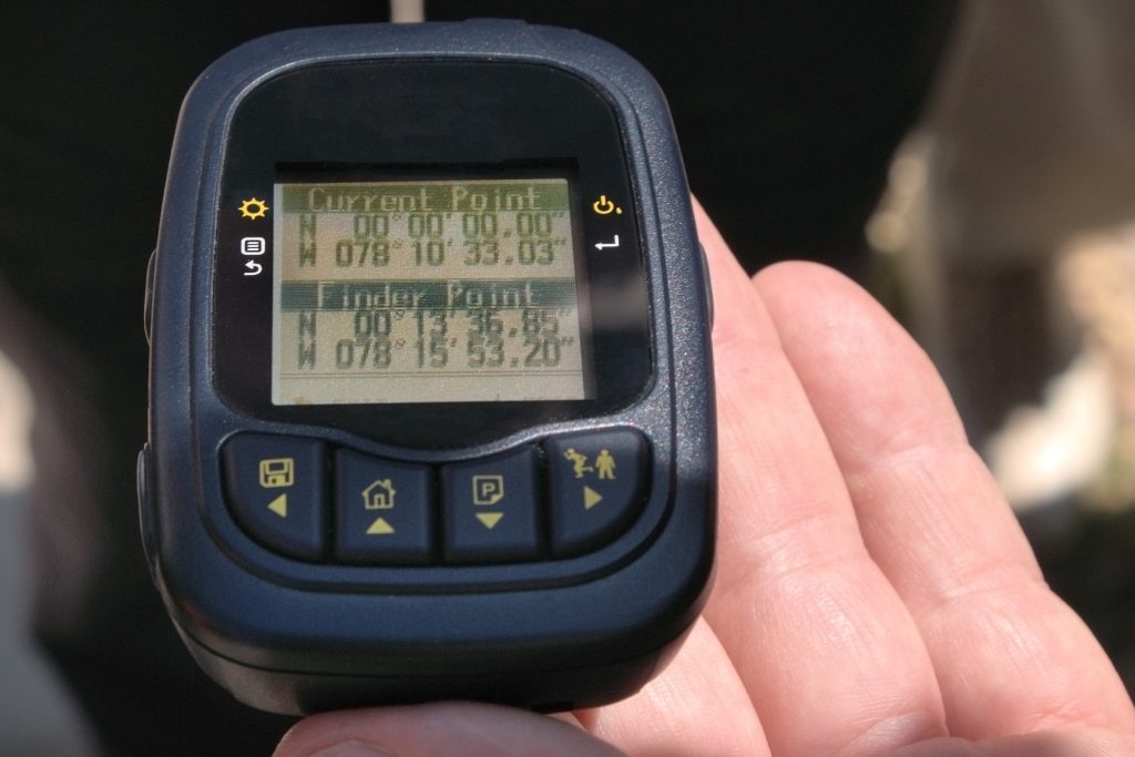 Hand,Holds,A,Gps,Logger,With,The,Coordinates,Of,The