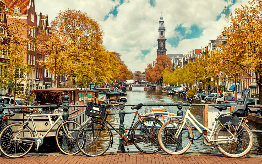 Bike,Over,Canal,Amsterdam,City.,Picturesque,Town,Landscape,In,Netherlands